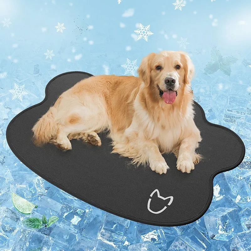 Ice silk dog cooling mat with dog head profile pattern in dark gray, non-slip base, shown on a wooden floor.