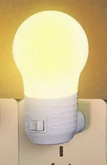 Plug-in bedside baby night light in round modern design with choice of white, blue or pink shell colours