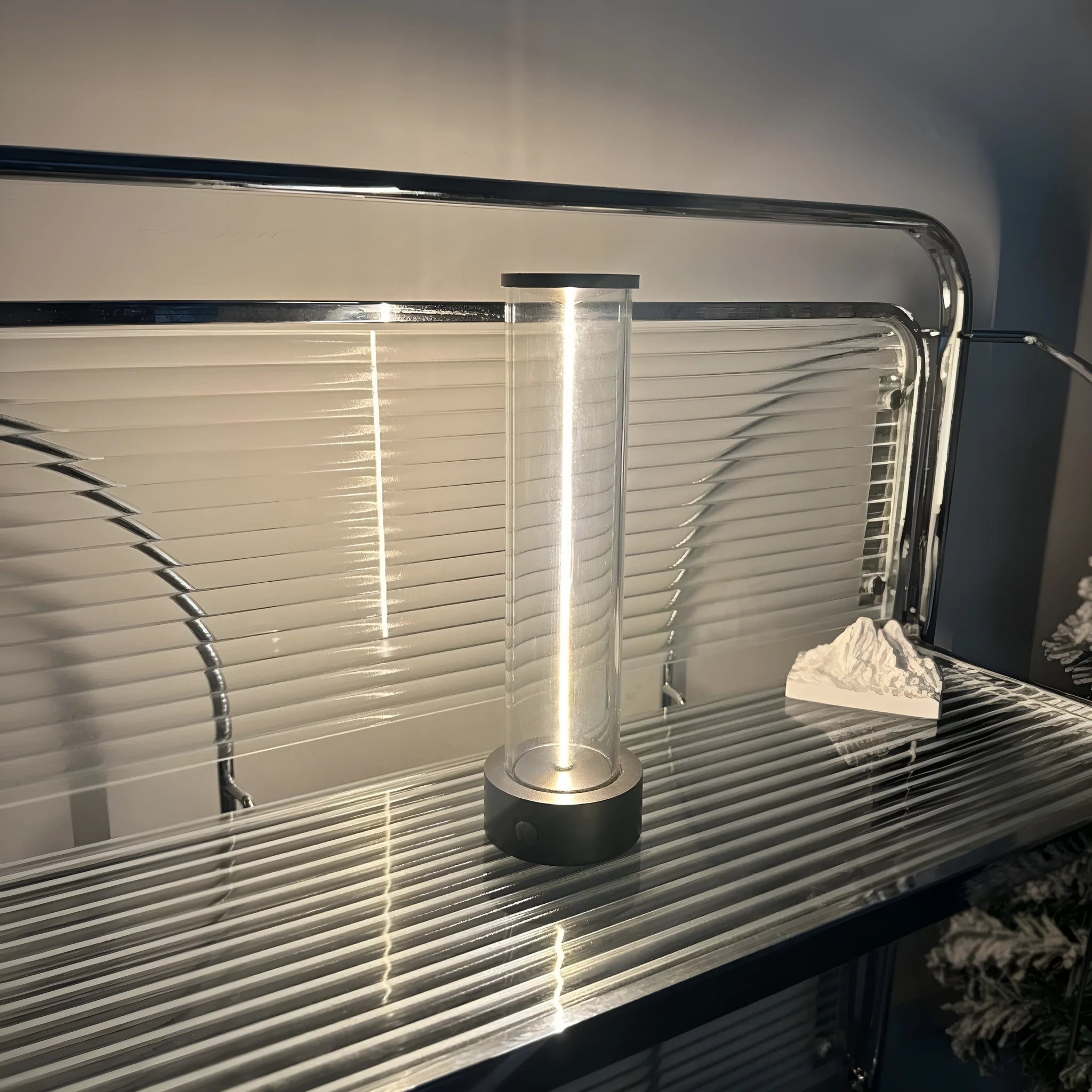 Contemporary LED line glass magnetic suction light strip with USB charging port visible