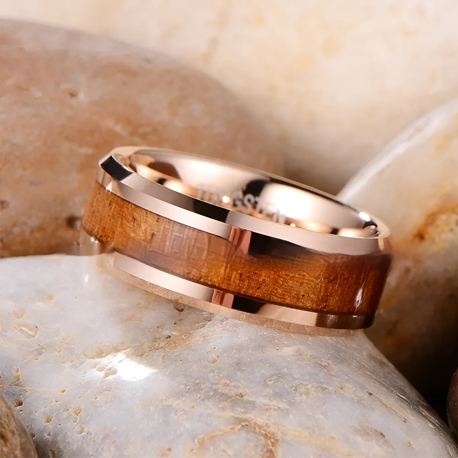 Men's 8mm wide Ugyen ring in wood, leather and tungsten, electroplated rose gold colour.