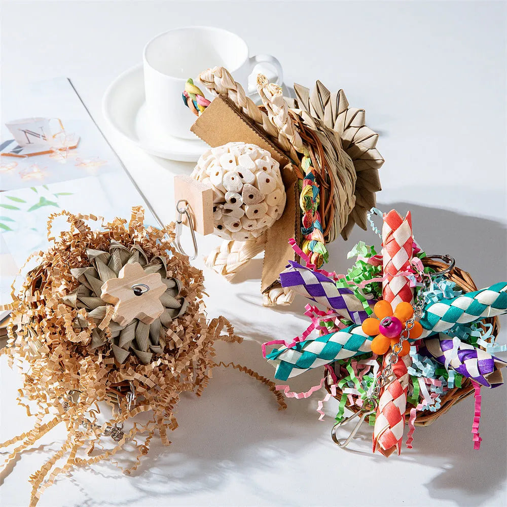 Parrot chewing toy with colourful plastic components and metal hanging chain for cage attachment
