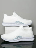 Men's solid colour casual sneakers with fabric upper and low-top design on a white background.