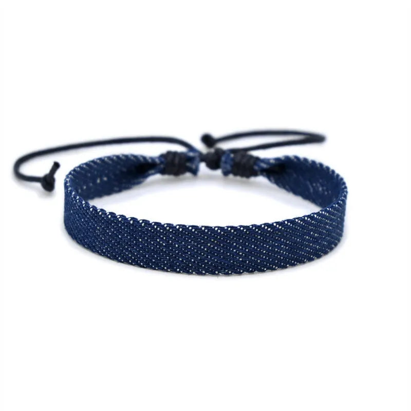 Denim fabric bracelet carrying strap in unisex design with mixed materials and cute styling