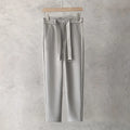 Boys slim straight wool trousers in business casual style with tapered fit and matching belt