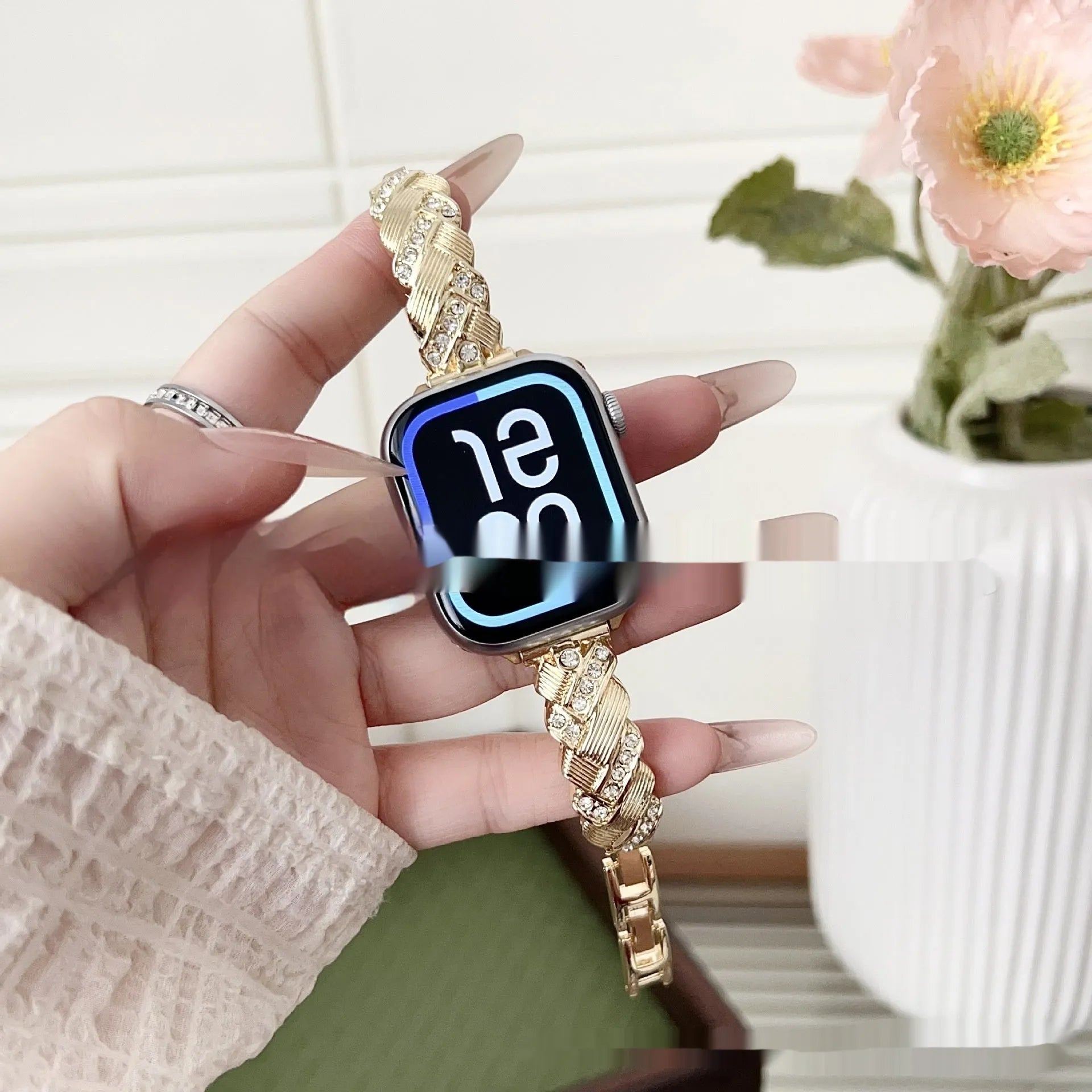 Personalised twist diamond design metal watch strap for Apple Watch in rose gold colour.