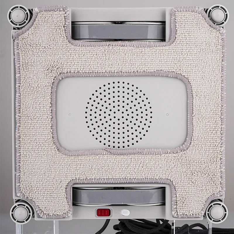 White intelligent window cleaning robot device with four water spray nozzles for automated high-rise window maintenance