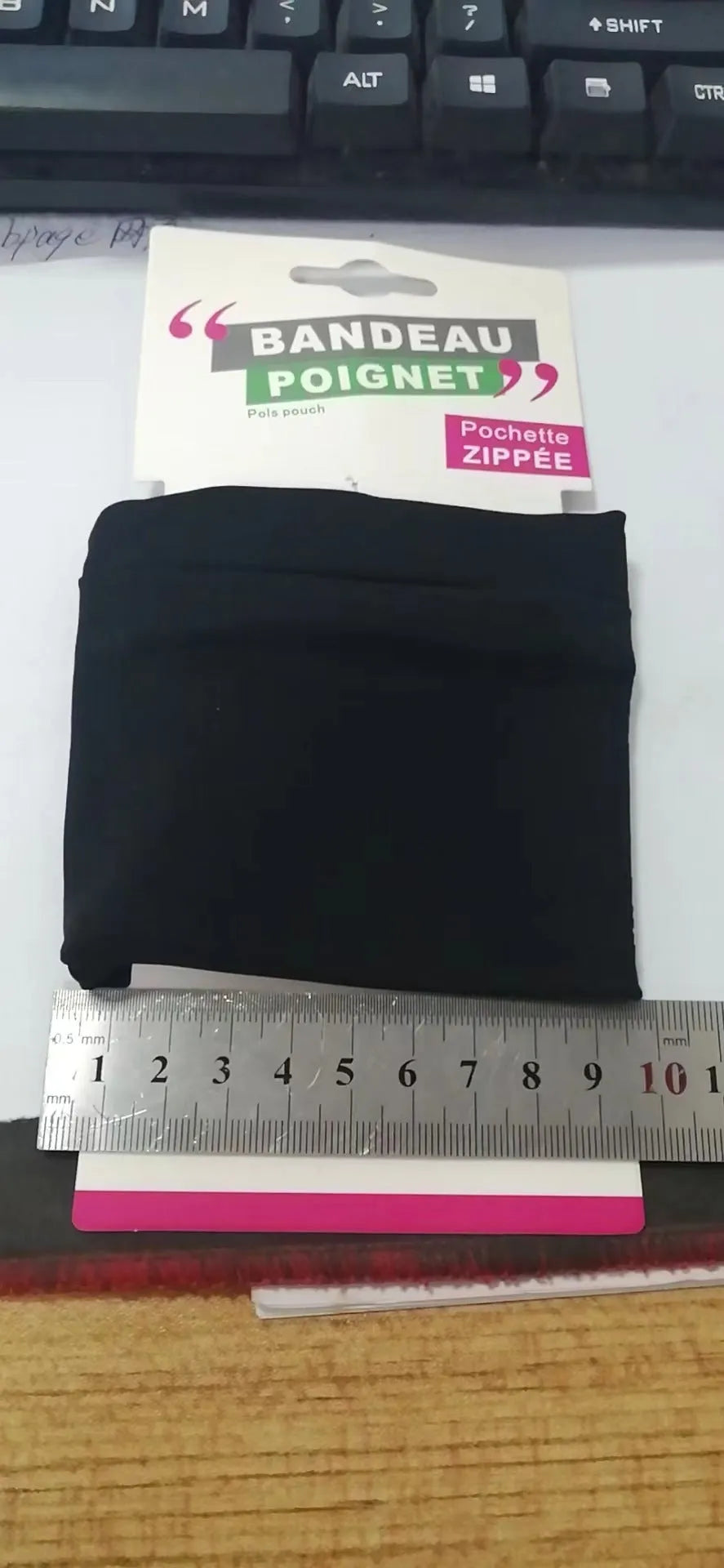 Waterproof wrist bag armband sleeve with OPP packaging measuring 10 by 10.5 centimetres