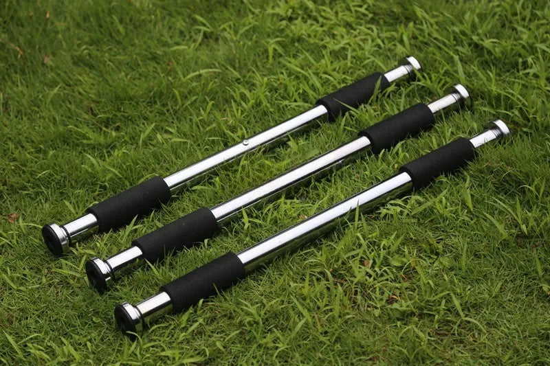 Steel adjustable doorway pull-up bar extended to its maximum 100cm width.