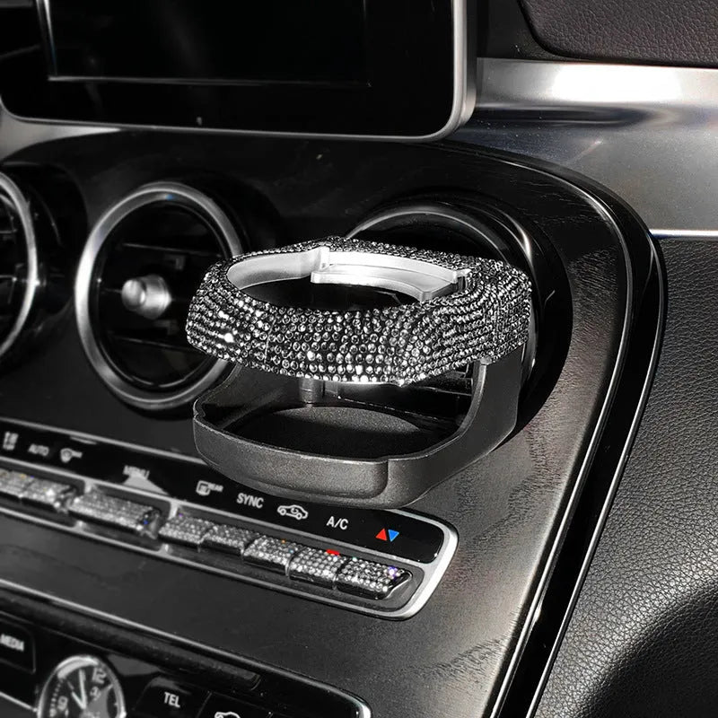 Rhinestone-decorated car cup holder bracket mounted on vehicle air vent in multiple colour options