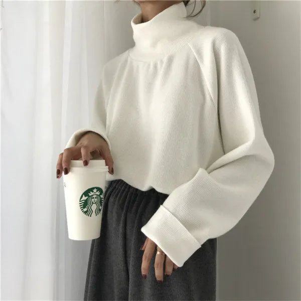 Women's half-high collar long sleeve top in solid colour with loose fit design