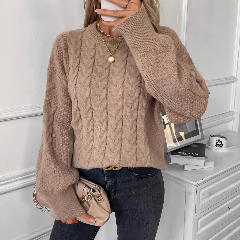 Women's khaki loose pullover sweater with round neck and twist detail on solid colour fabric