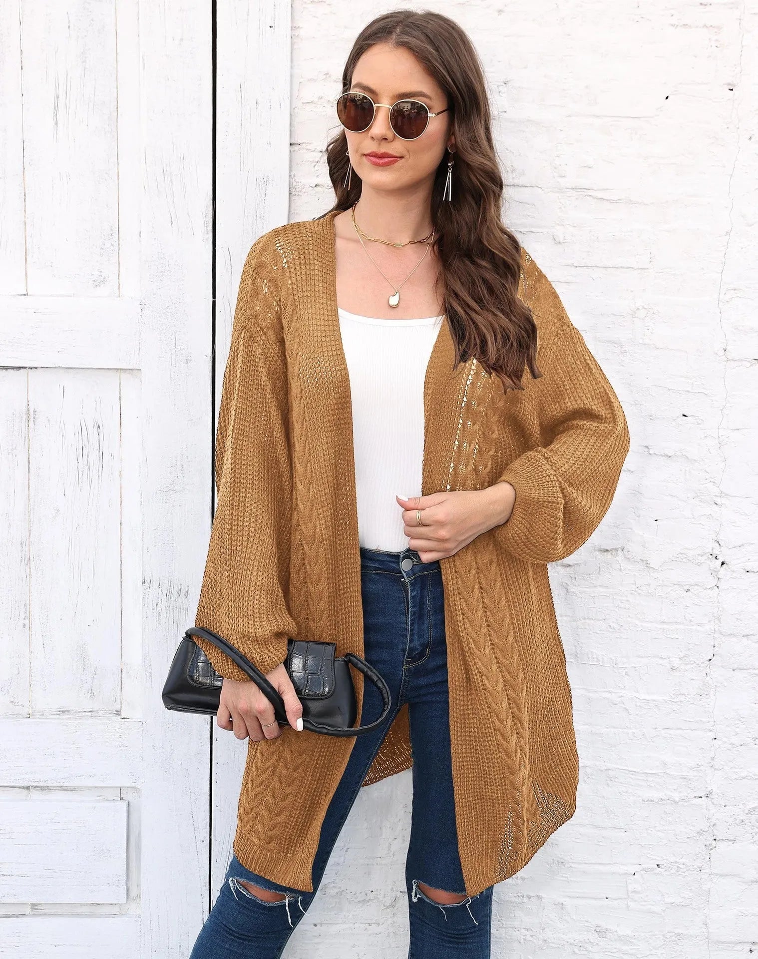 Women's loose fit acrylic sweater coat in army green, shown front on, casual style.