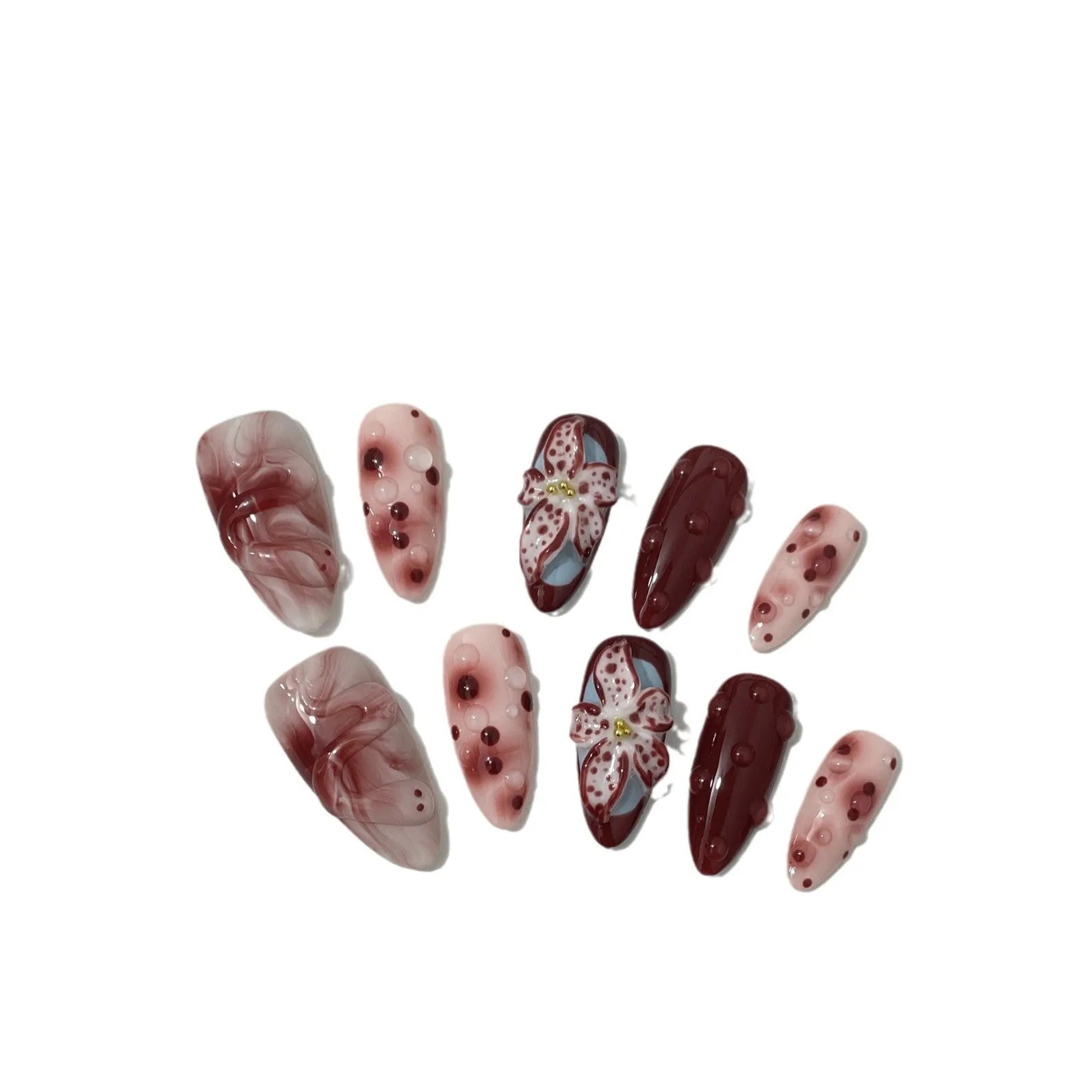 Almond-coloured false nails with hand-painted 3D carved rose designs, shown in medium length.