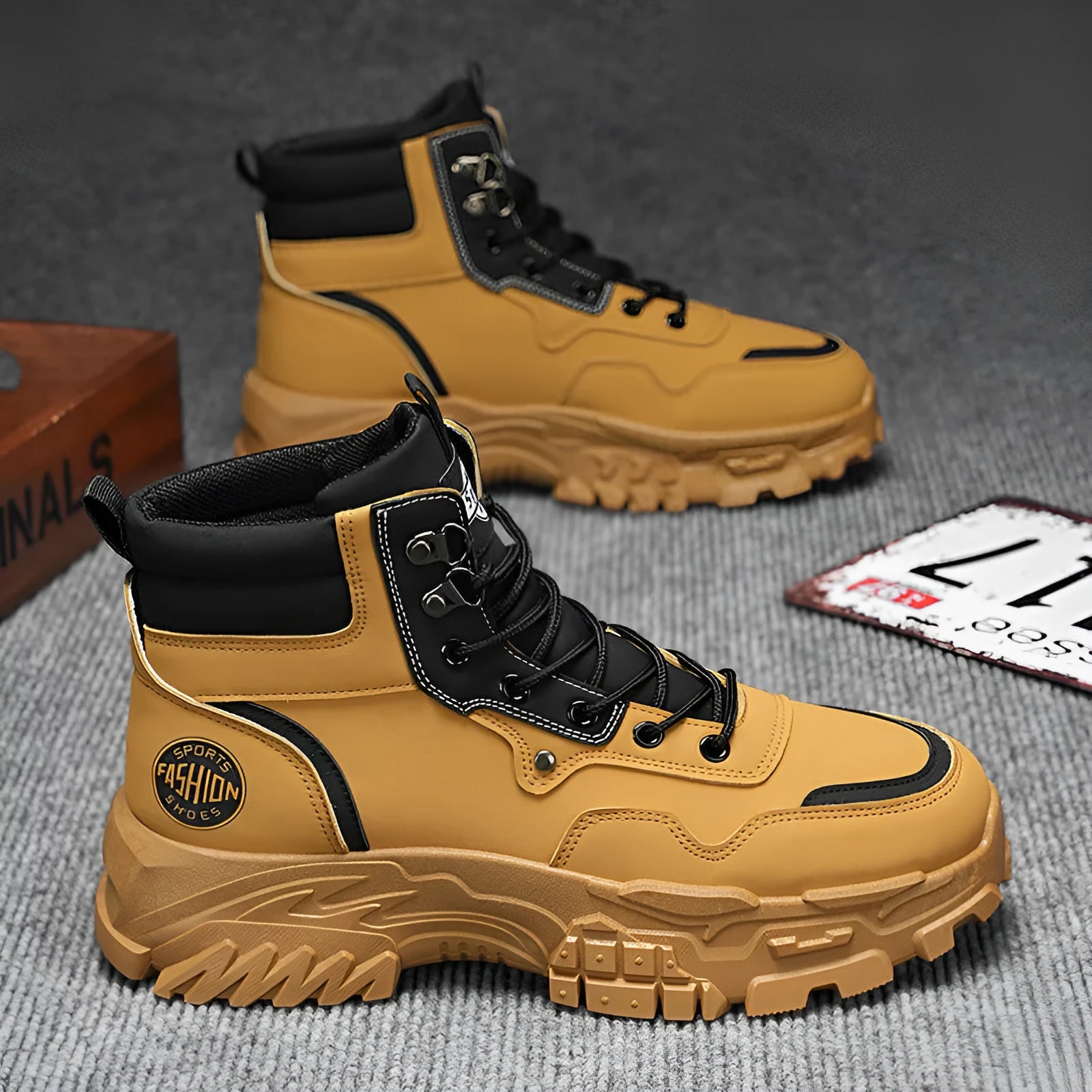 Men's black and yellow mid-calf Martin boots with an artificial PU upper and stout heel.