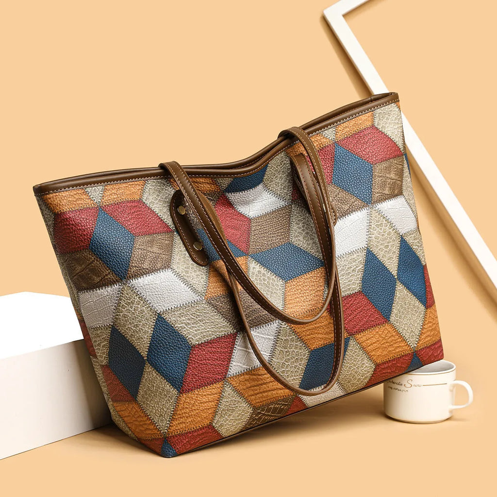 Women's large capacity PVC handbag in blue brown colour with sandwich pocket design for business and leisure use