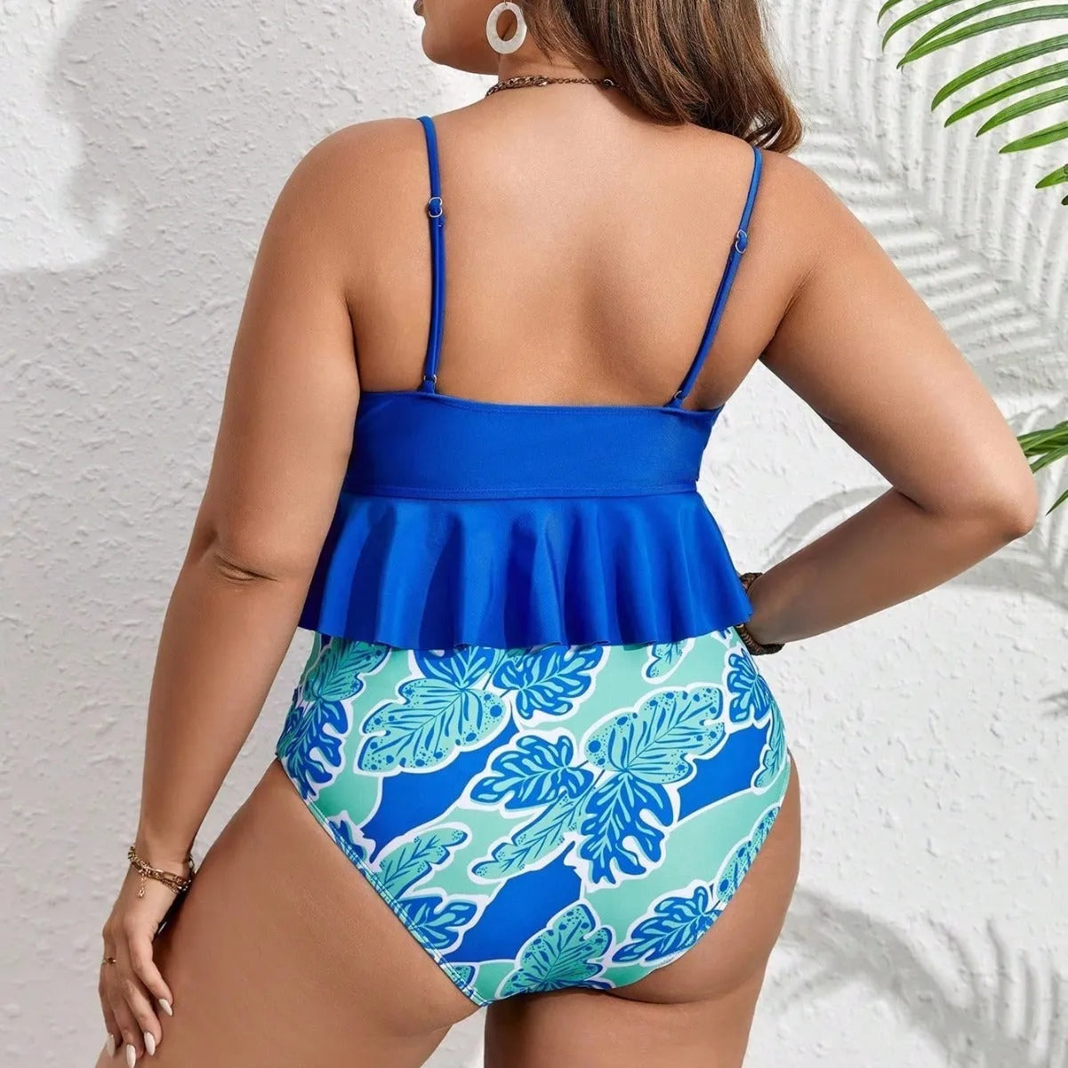 Blue polyester bikini set with separate top and brief shorts for European and American sizing.