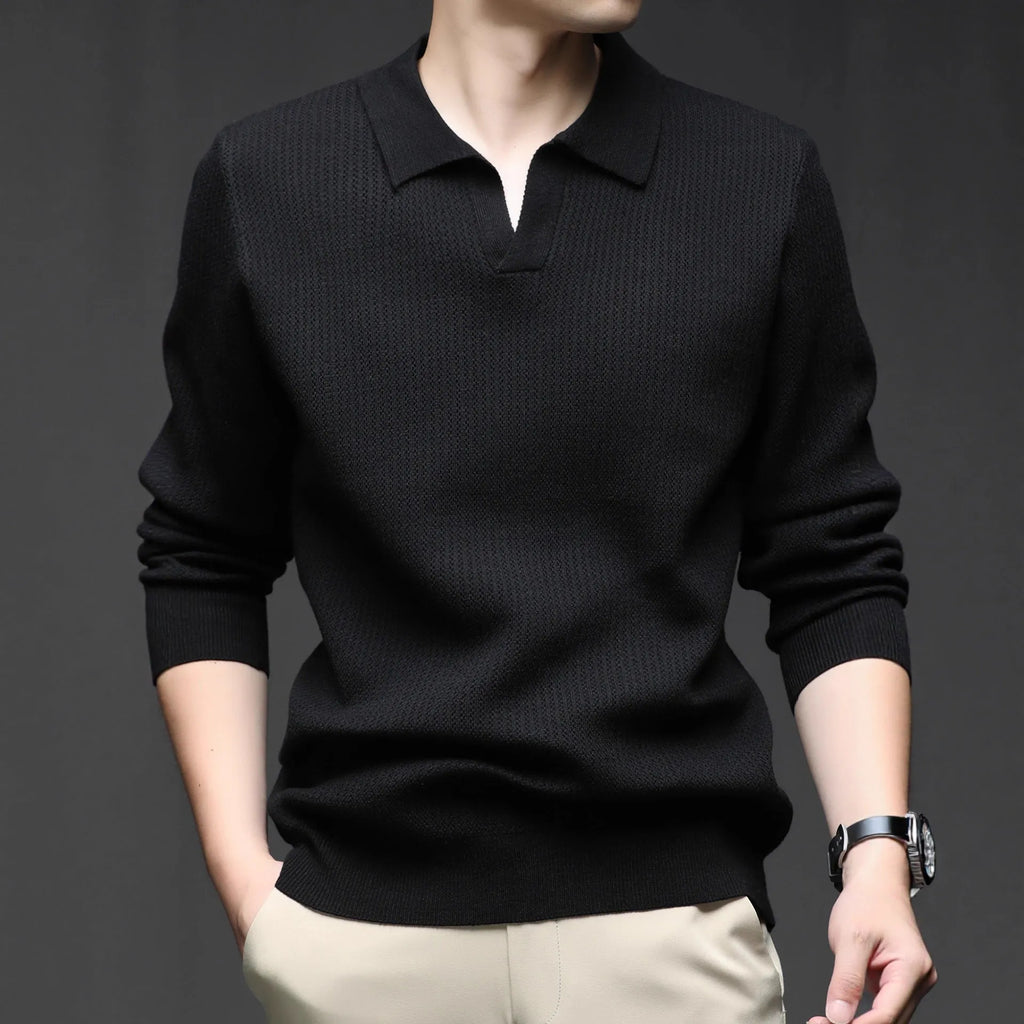 Man wearing a loose-fit green casual pullover sweater for autumn leisure.