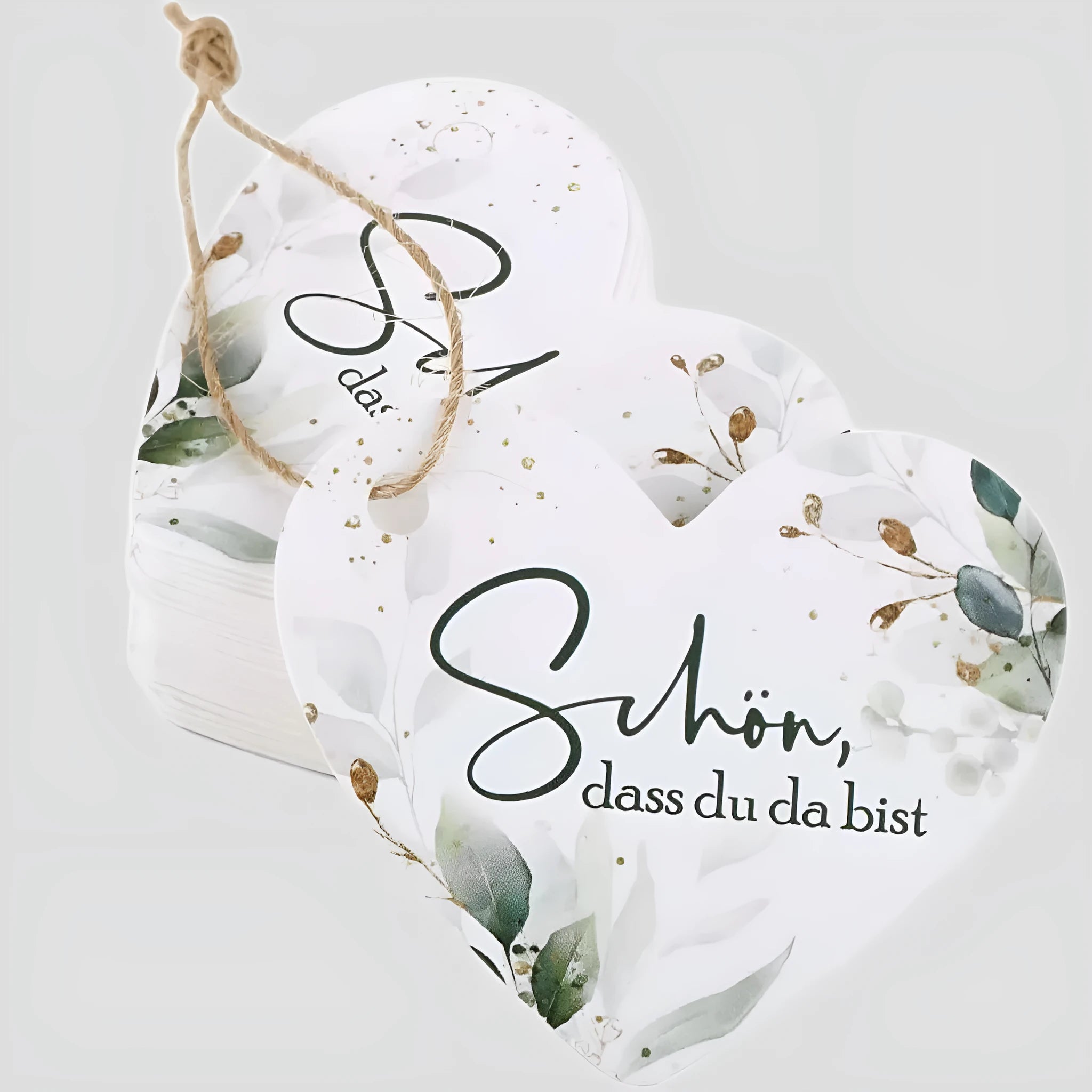 Set of 50 floral heart-shaped paper gift tags in two colour variations.