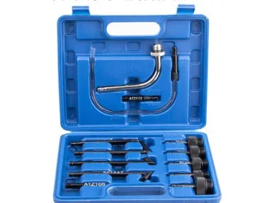Automatic transmission oil refuelling kit showing transmission injector tool and set of funnels