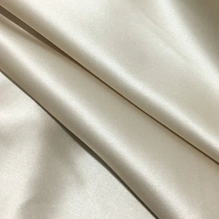 Dark grey 19 momme mulberry silk pillowcase with an envelope closure, laid flat.