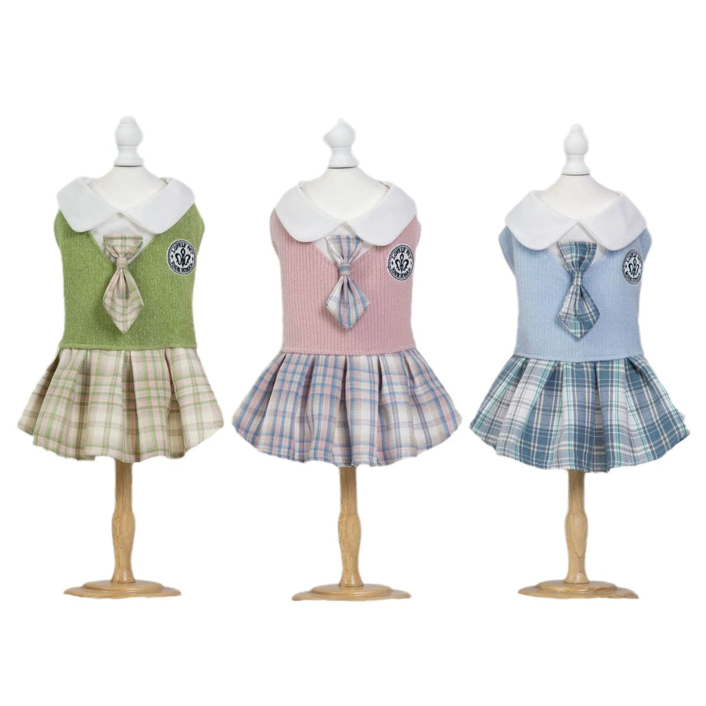 A tartan skirt for small pets in pink, blue, or green, made from polyester fabric.
