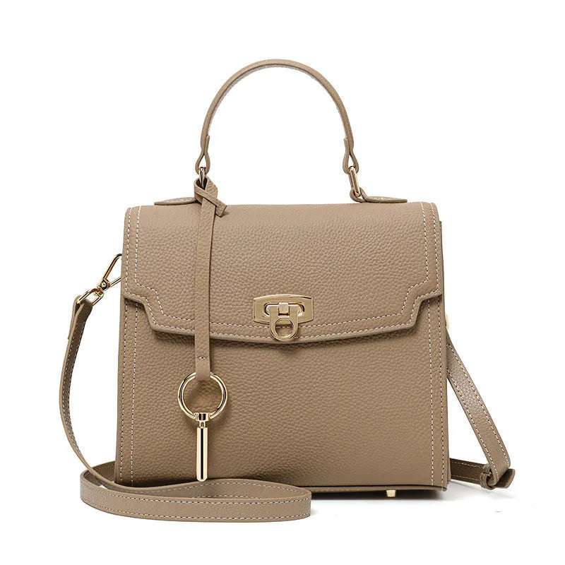 Elephant grey vintage lock handbag in genuine leather with three-dimensional pockets