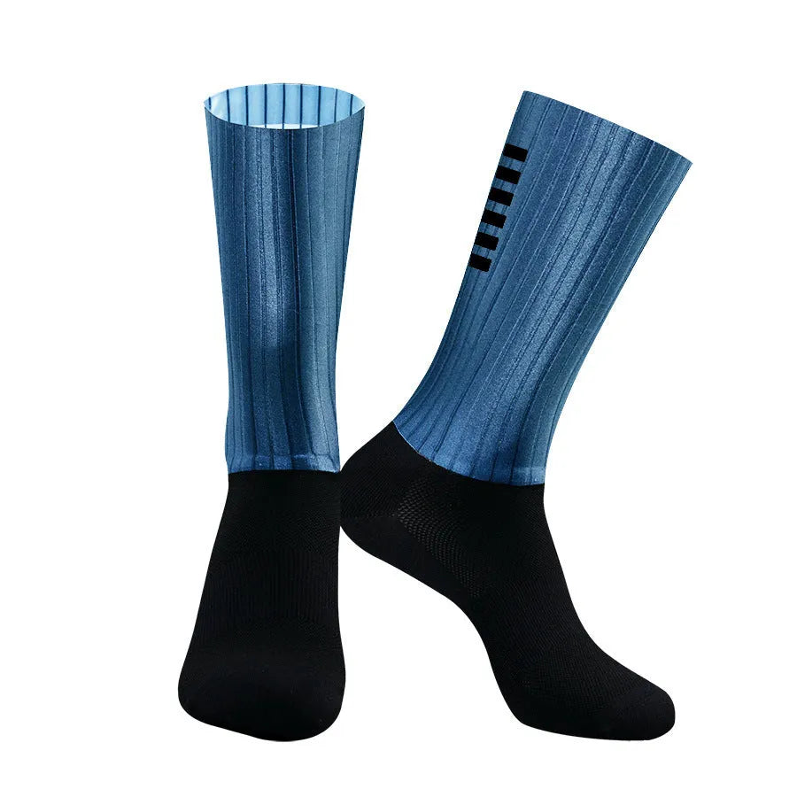 A pair of breathable athletic cycling socks in a chemical fibre blend, shown in one of six available colours.