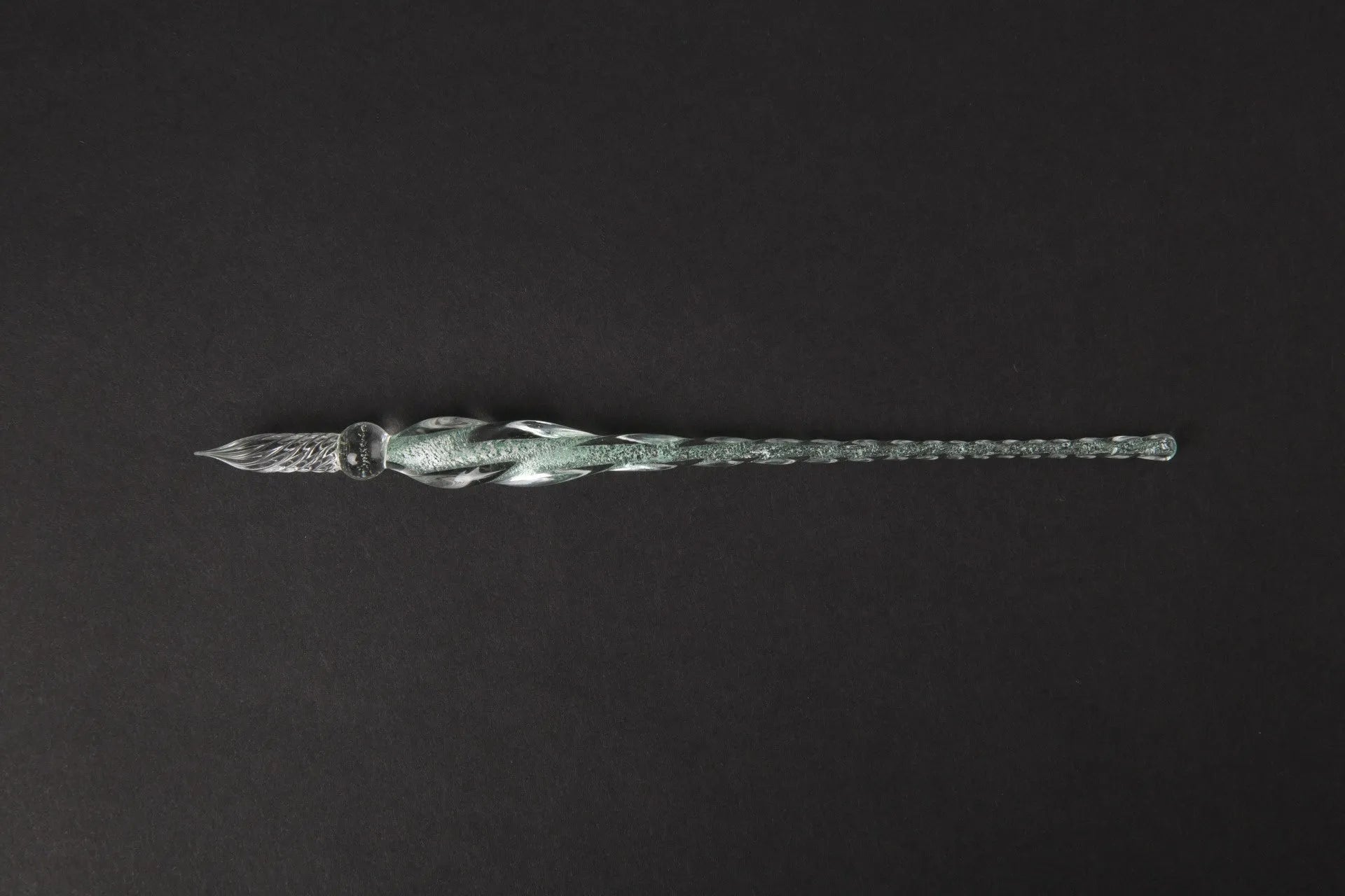 Transparent coloured glass crystal pen with water art ink in gift box, shown in multiple colour options.