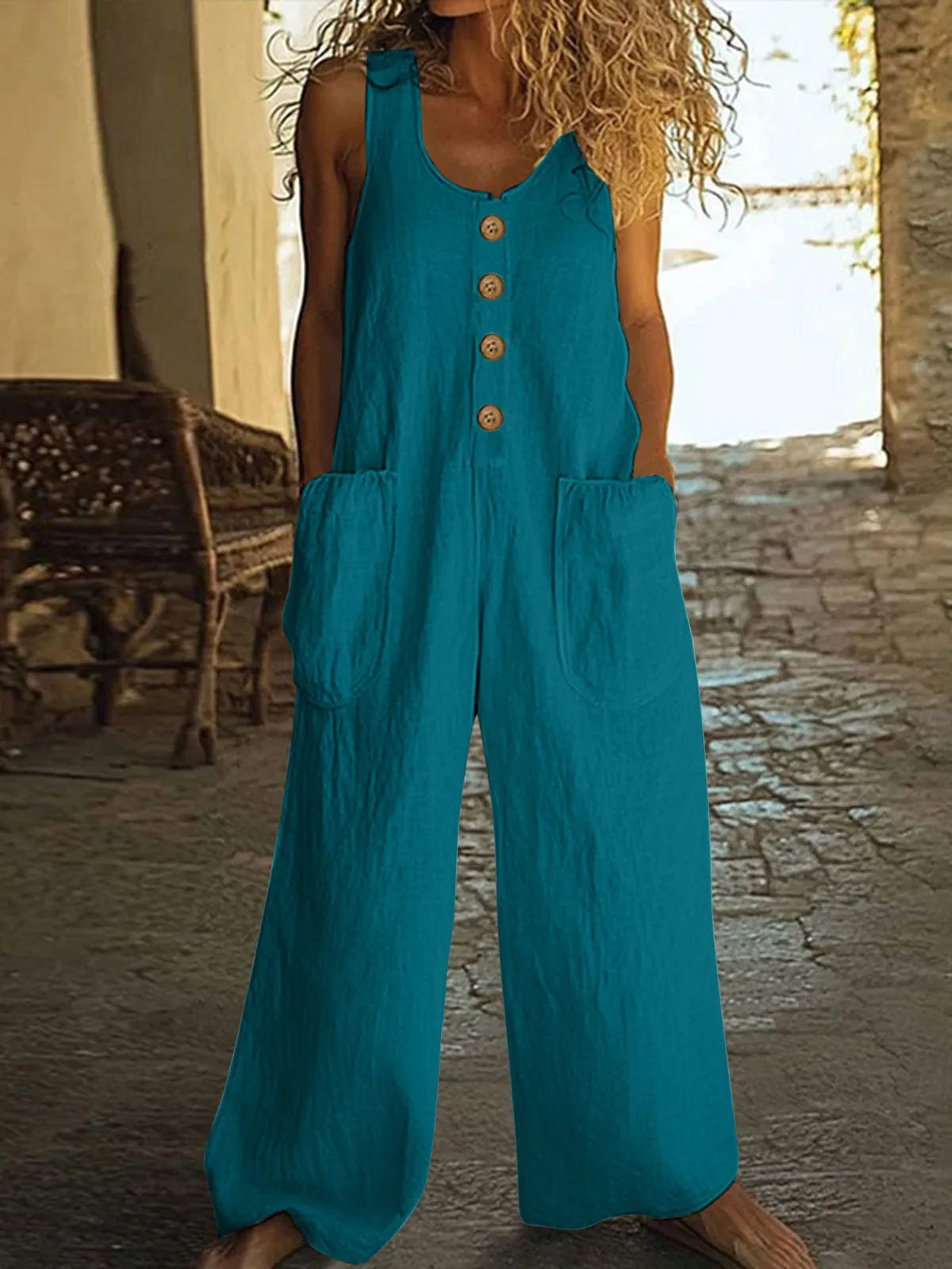 Sleeveless cotton jumpsuit with wide leg trousers in art retro styling with pocket details
