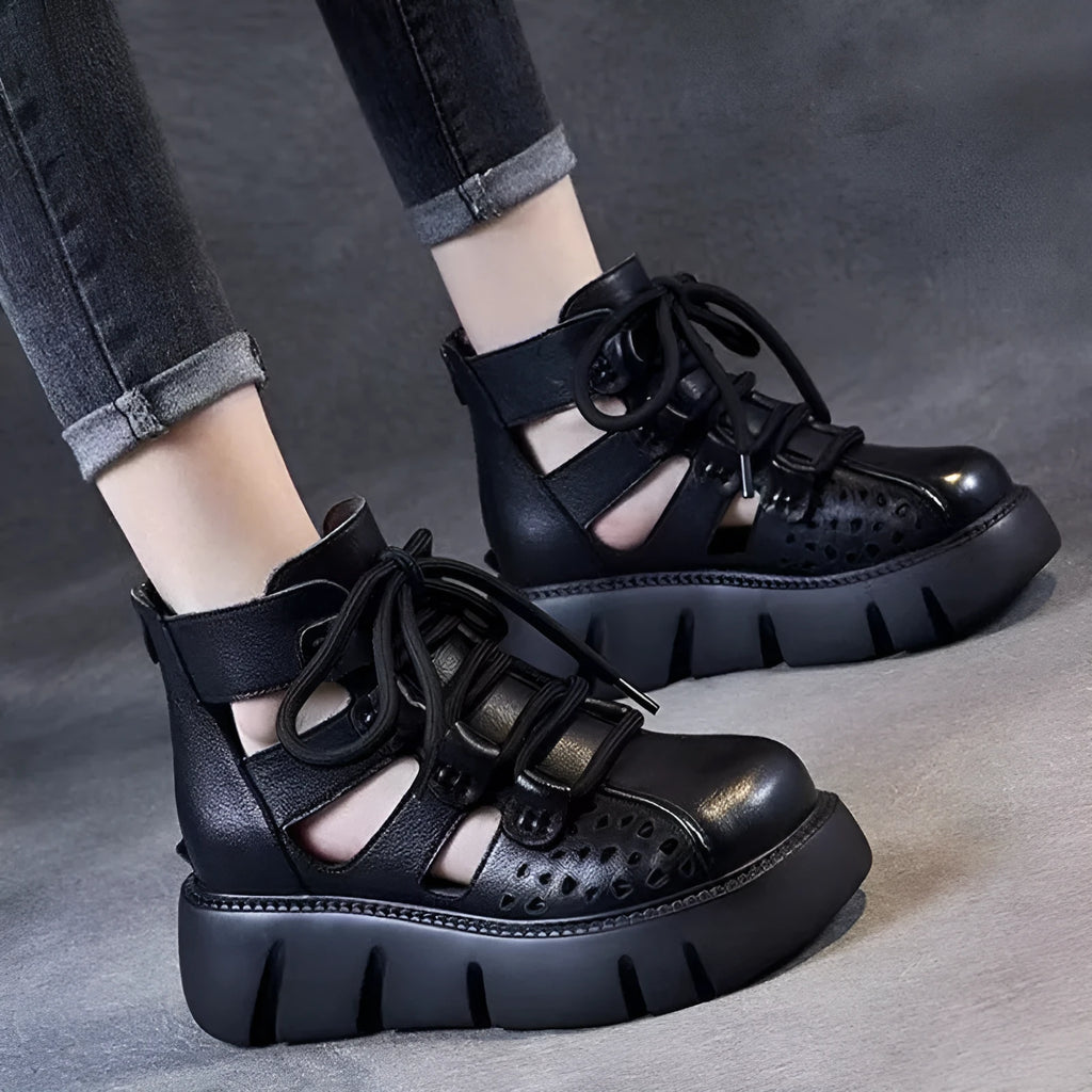 Women's black plush leather platform sandals with fish mouth toe and hollow hole design on a PU sole.