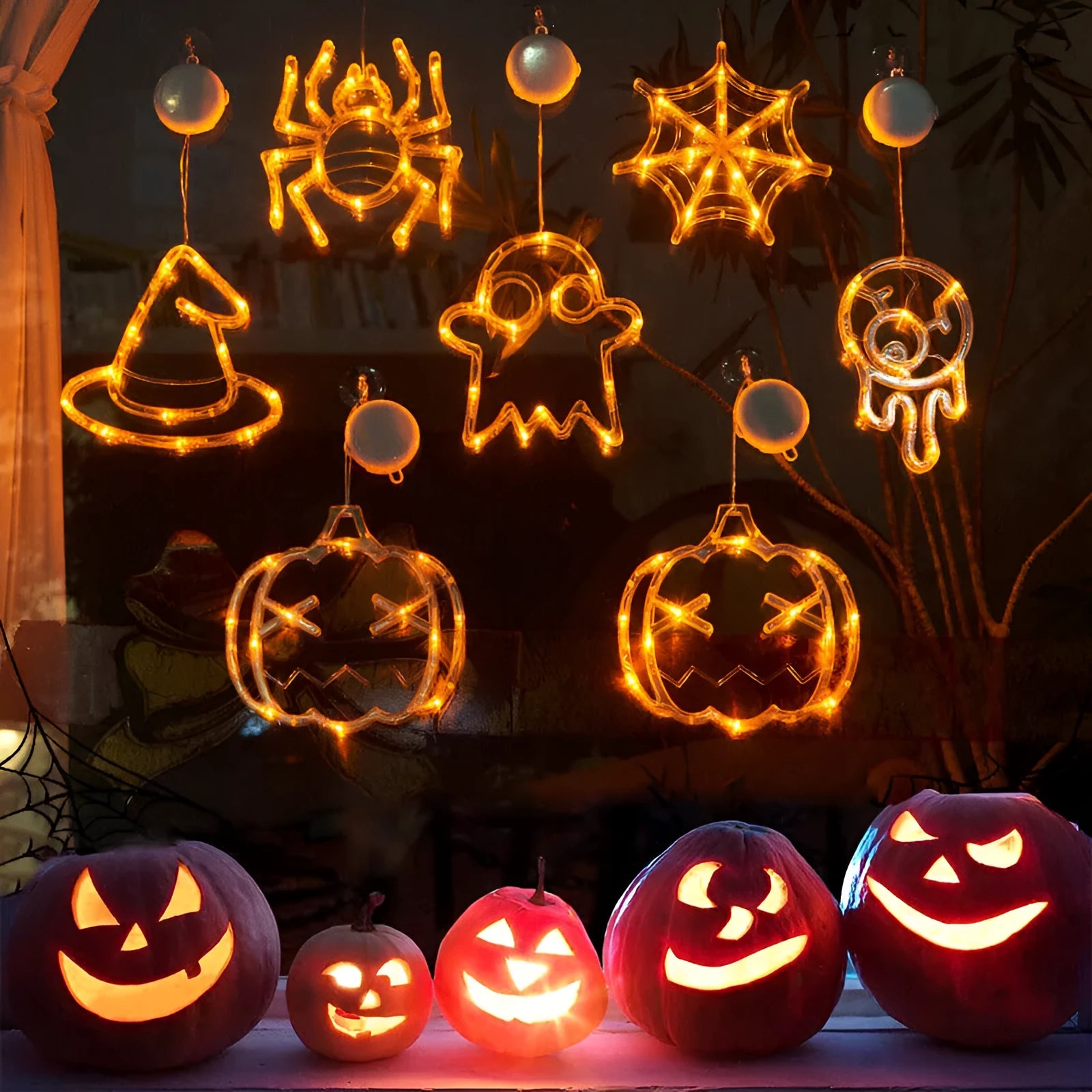 Set of seven Halloween-themed LED hanging lights with suction cups for window display