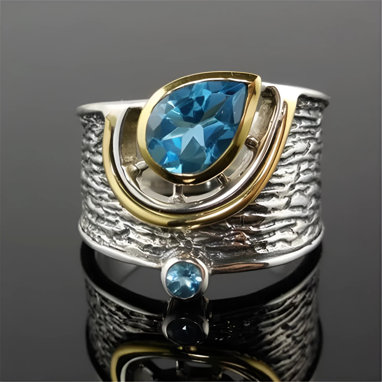 Chinese style women's blue zircon ring with drop shape design and inlaid detailing