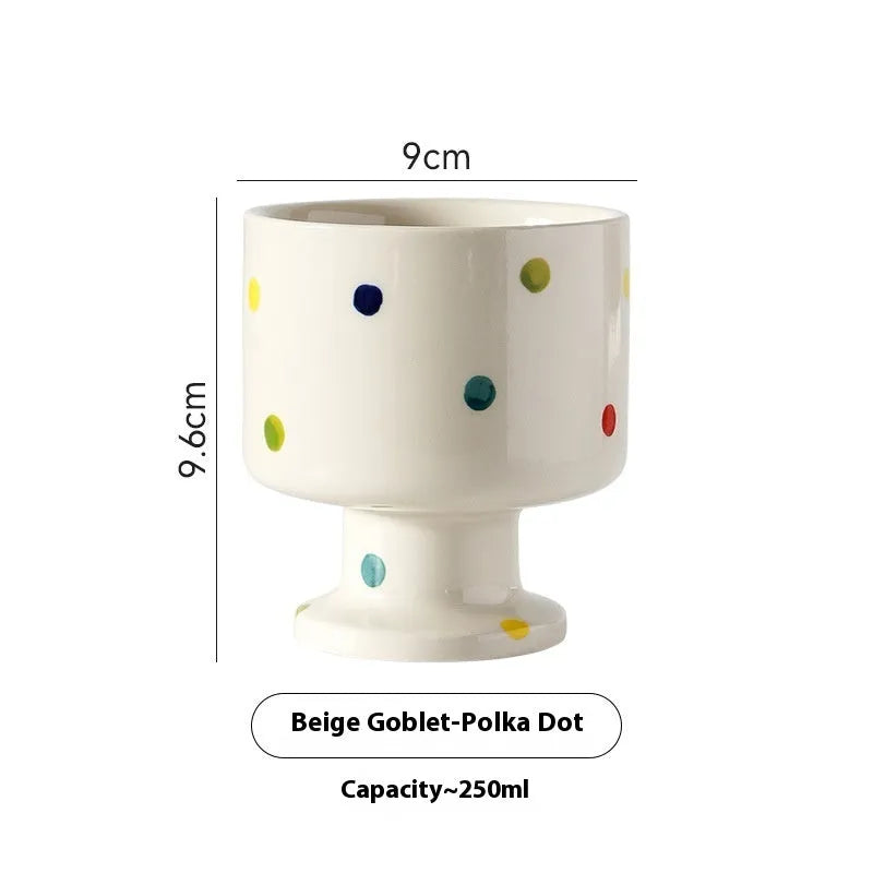 Hand-pinched irregular ceramic mug in a solid colour, showing unique handmade shape.