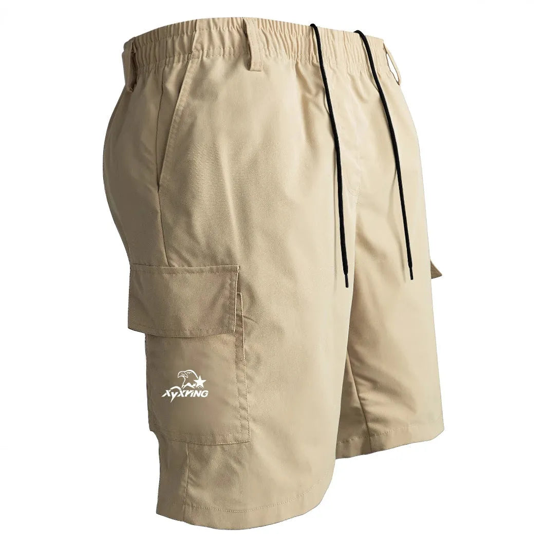 Man wearing straight-leg casual shorts in khaki colour, showing the relaxed fit and shorts length