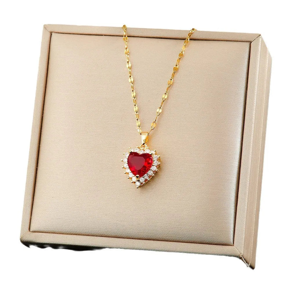 Gold red titanium steel necklace with hearts flower pendant and mixed gemstone inlay, matching ring and earrings.