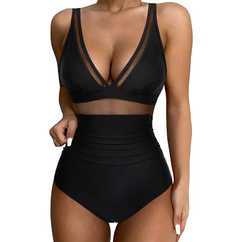 Black halter neck one-piece swimsuit with mesh detailing on adult female model