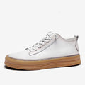 A pair of men's black leather casual shoes with a lace-up front and round toe on a white background.