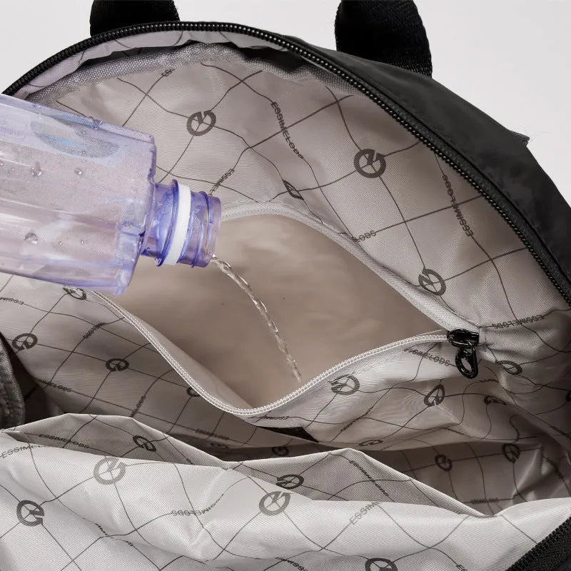 Outdoor backpack showing 48cm height dimensions with nylon material and organisational pockets