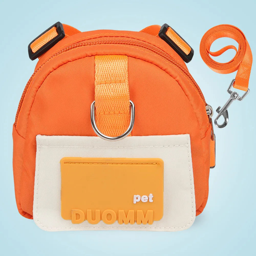 Blue adjustable dog harness backpack with storage compartment and tow rope shown on a medium-sized dog.