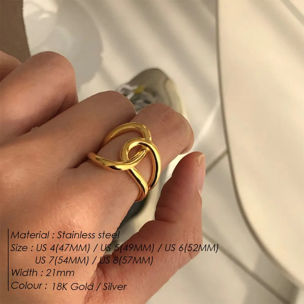Adjustable opening ring with knotted geometric design in stainless steel gold or steel colour