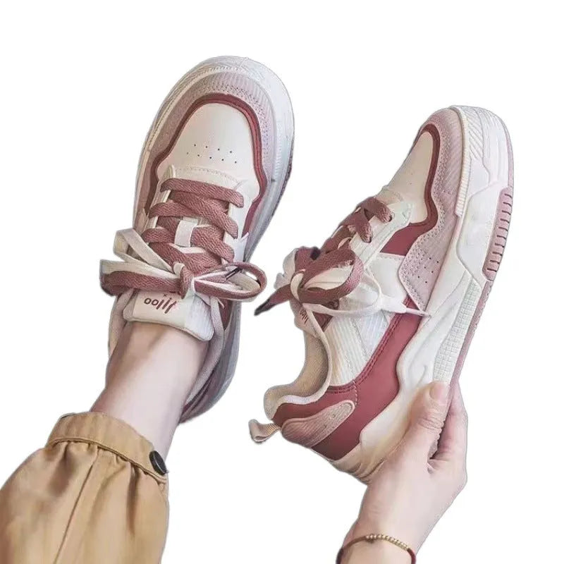 Spring rubber sneaker low top in pink and milky white colours with height increasing function