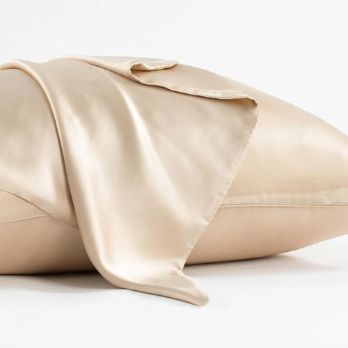 Dark grey 19 momme mulberry silk pillowcase with an envelope closure, laid flat.
