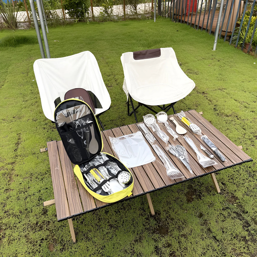 12-piece stainless steel picnic kitchenware set inside a khaki portable storage bag.