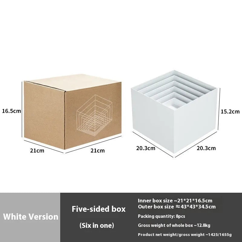 White plastic dessert table display stand with six cube-shaped racks for cakes and pastries.