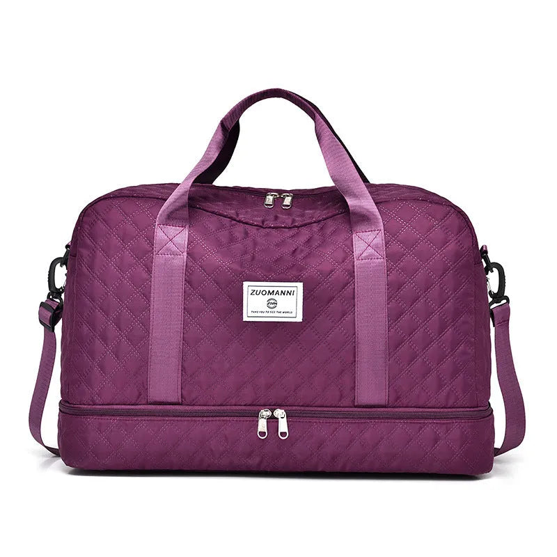Large Oxford cloth travel bag with 36-55 litre capacity shown in haze blue colour