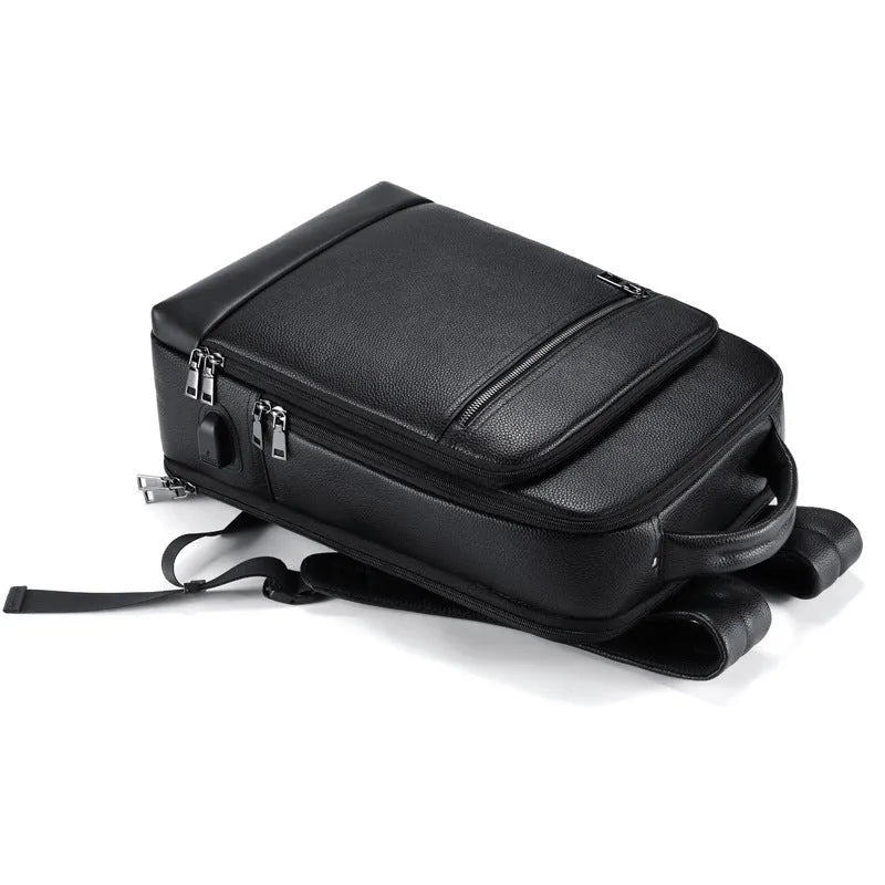 Black men's leather business backpack with curved shoulder straps and sewing line detailing