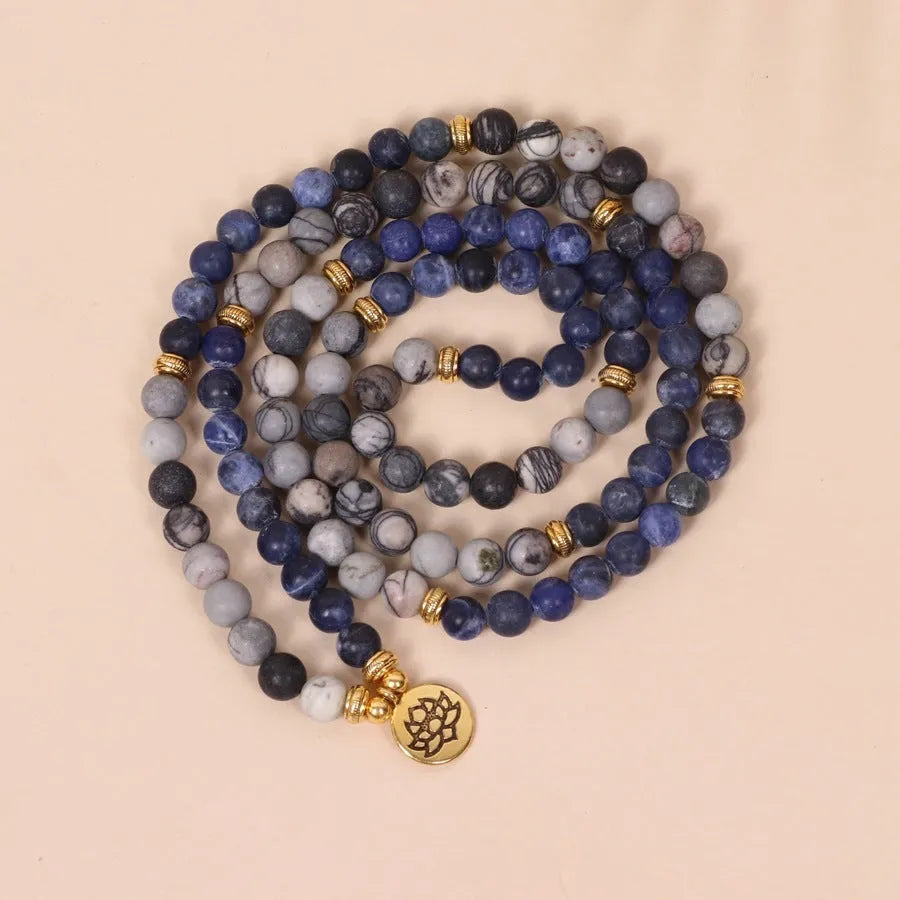 Blue patterned network stone beads on multi-layer alloy metal bracelet showing fresh sweet style