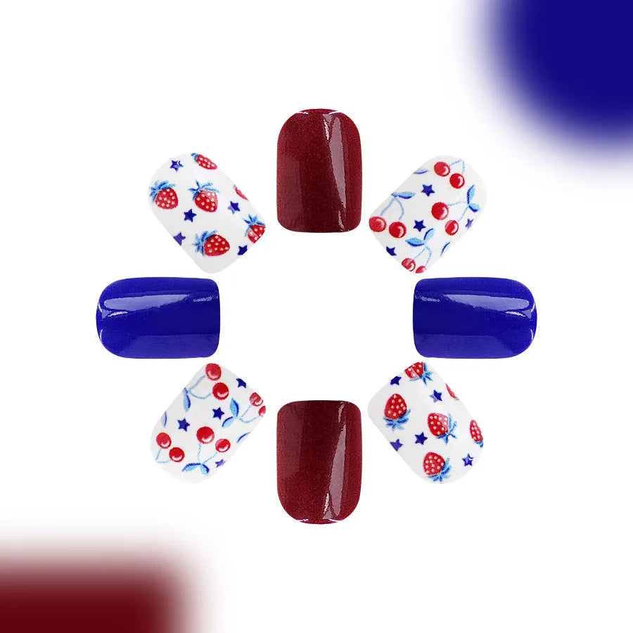 Short glossy nail stickers with red and blue strawberry and cherry pattern, 24 pieces.