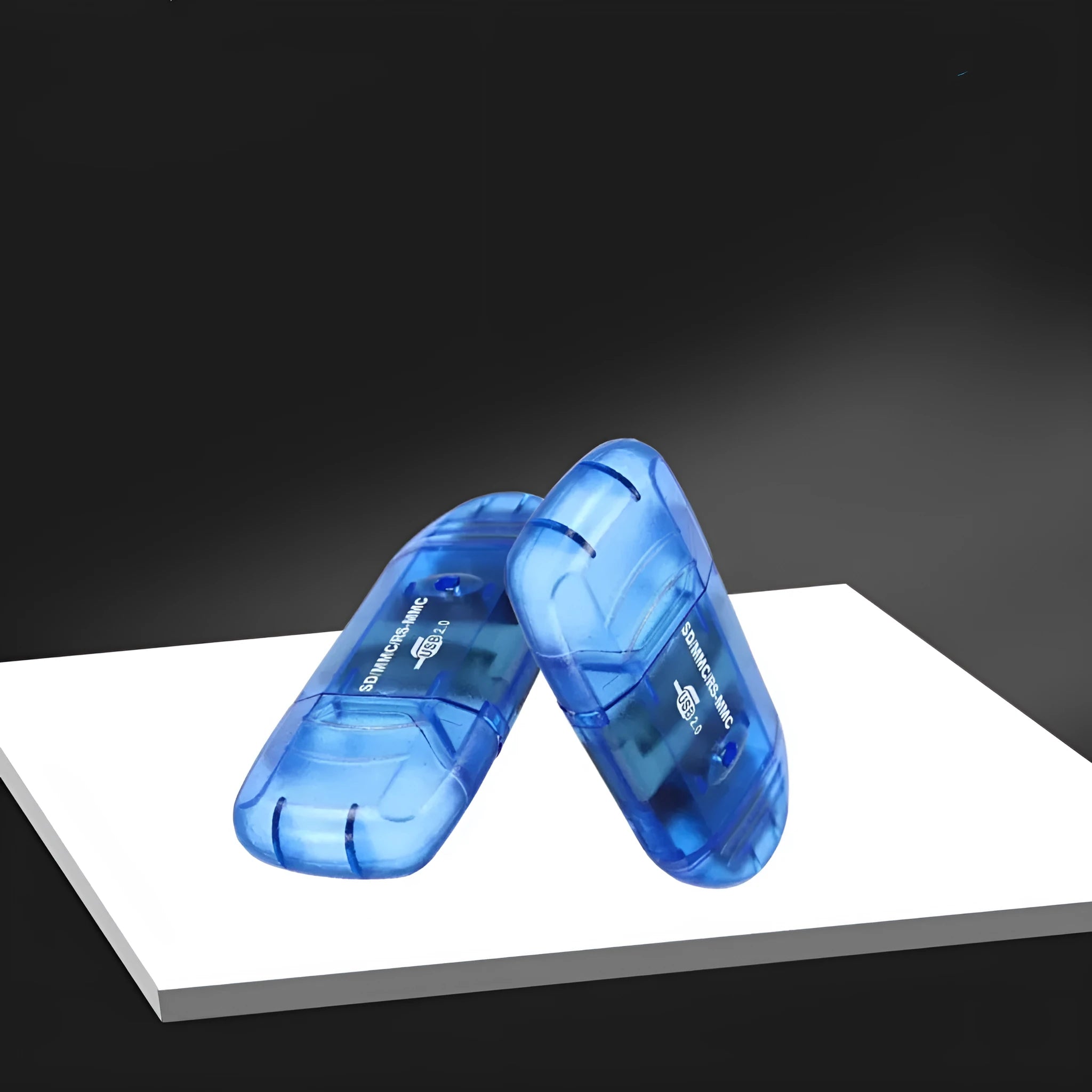 Transparent USB card reader with LED light showing memory card slots and USB plug