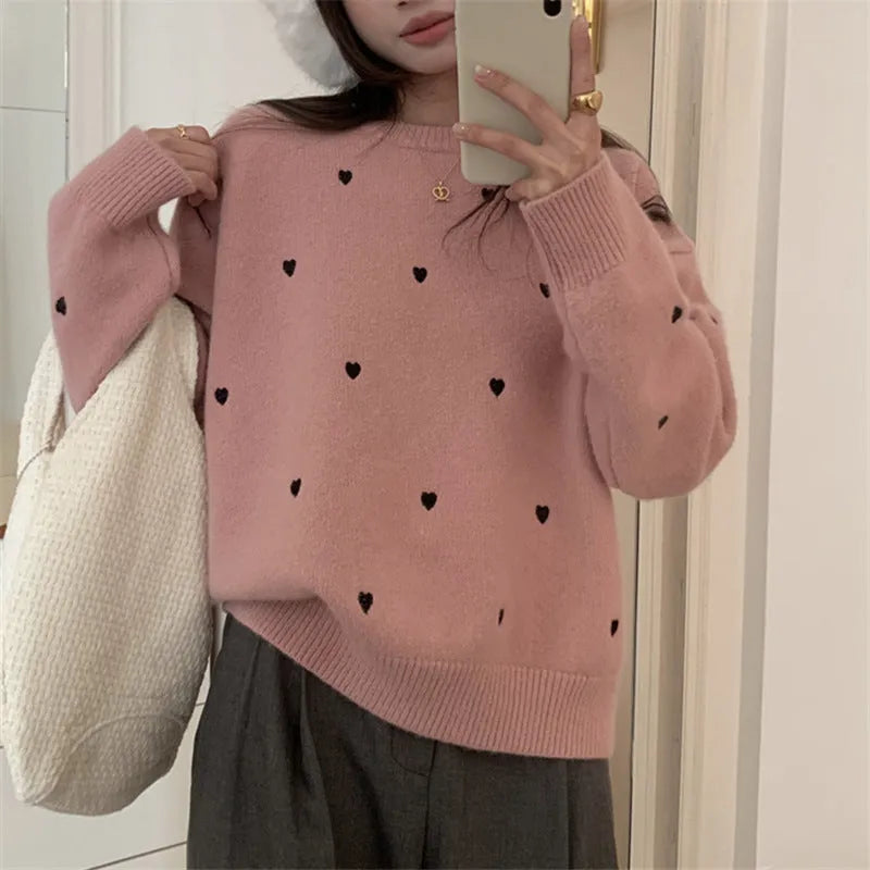 Women's loose fit long sleeve acrylic pullover sweater with love embroidery in milky white.